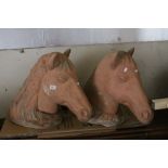 Two Terracotta Horses Heads, 51cms high