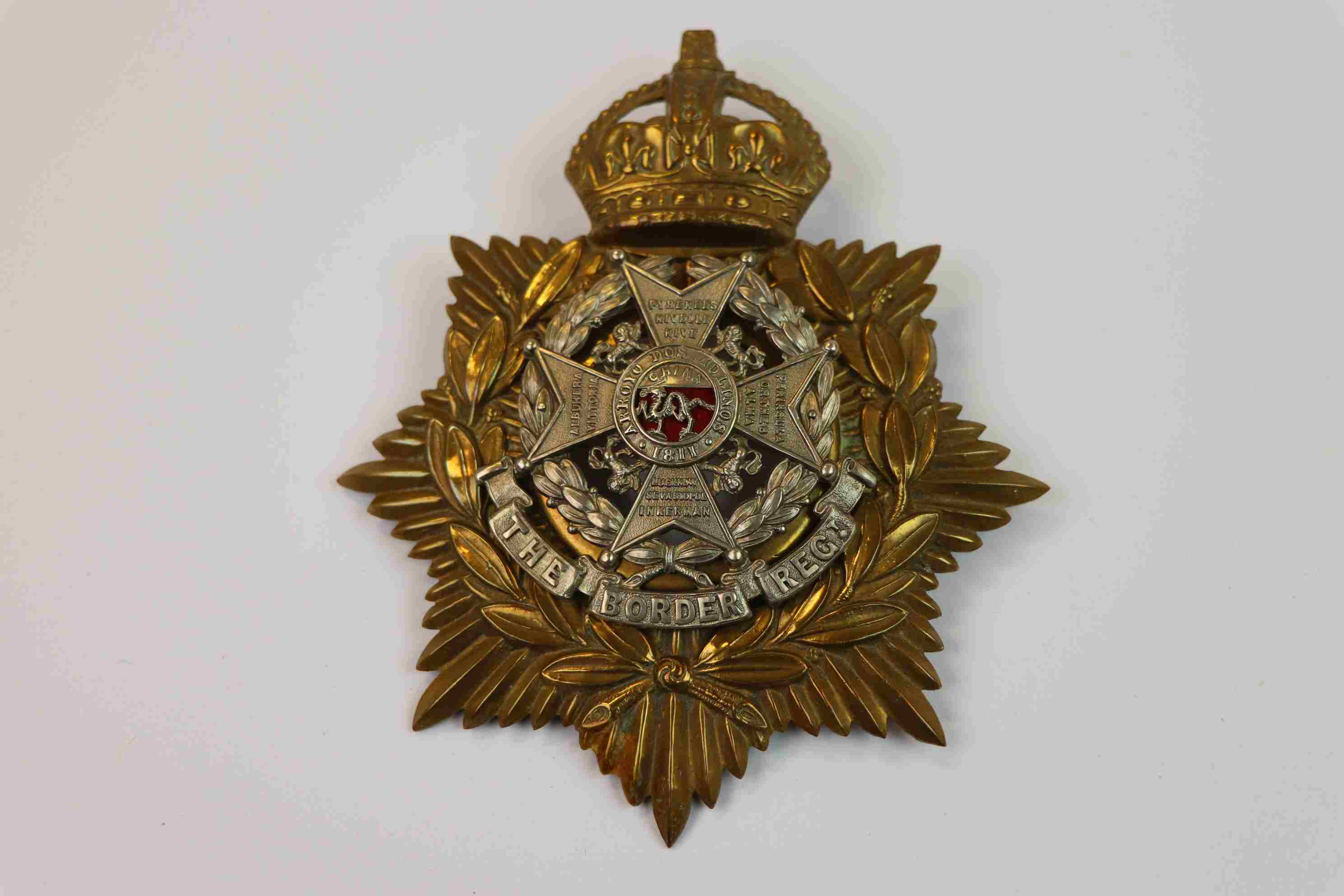 A King Crown The Border Regiment Helmet Plate / Badge.