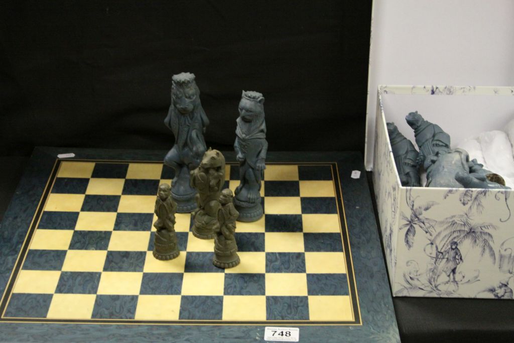 Plaster Chess Set in the form of Mythical Creatures and a Wooden Chess Board