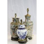 Three Oriental Ceramic Table Lamps. on Wooden Stands, tallest 45cms high