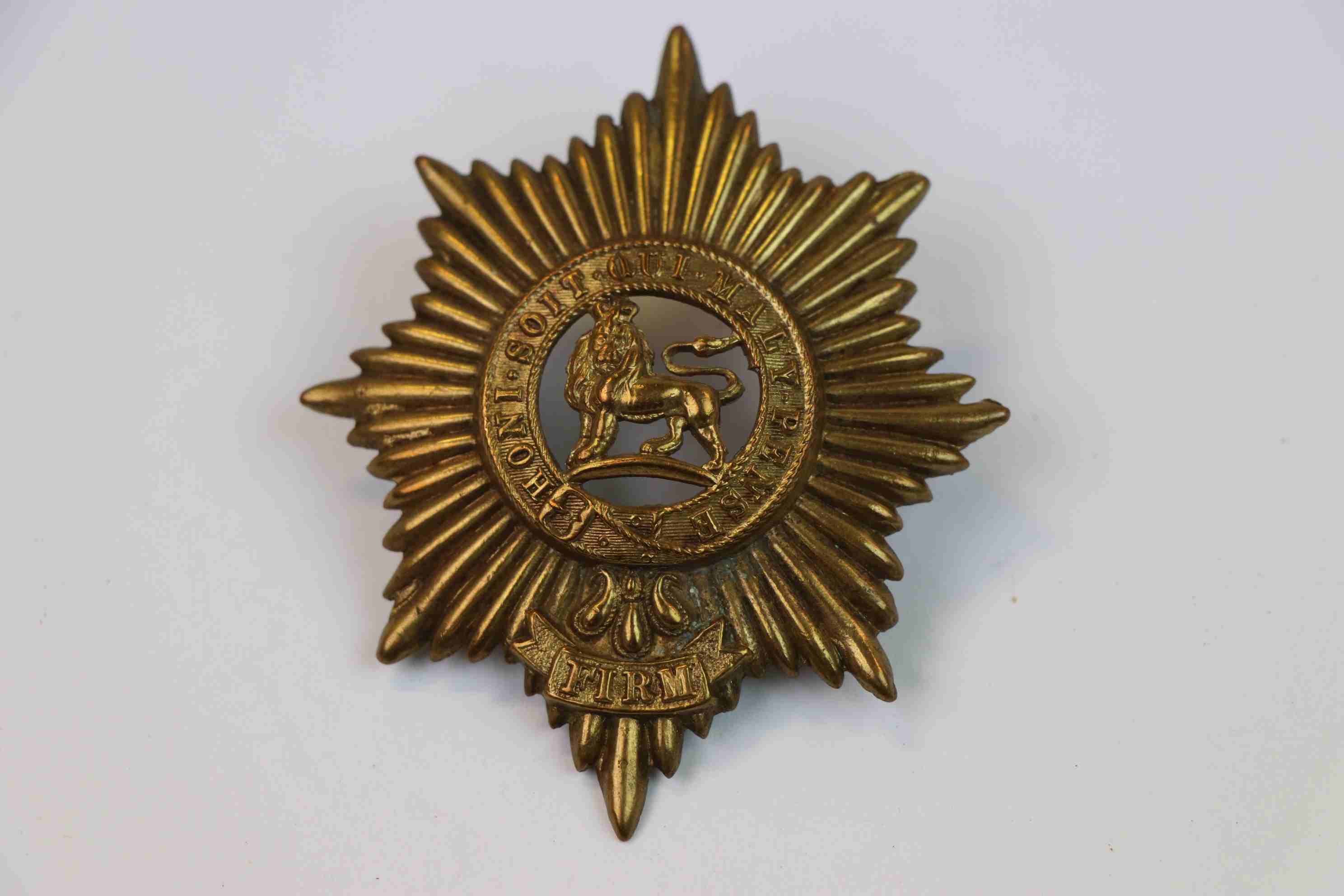 A Worcestershire Regiment Brass Band Cap Badge.