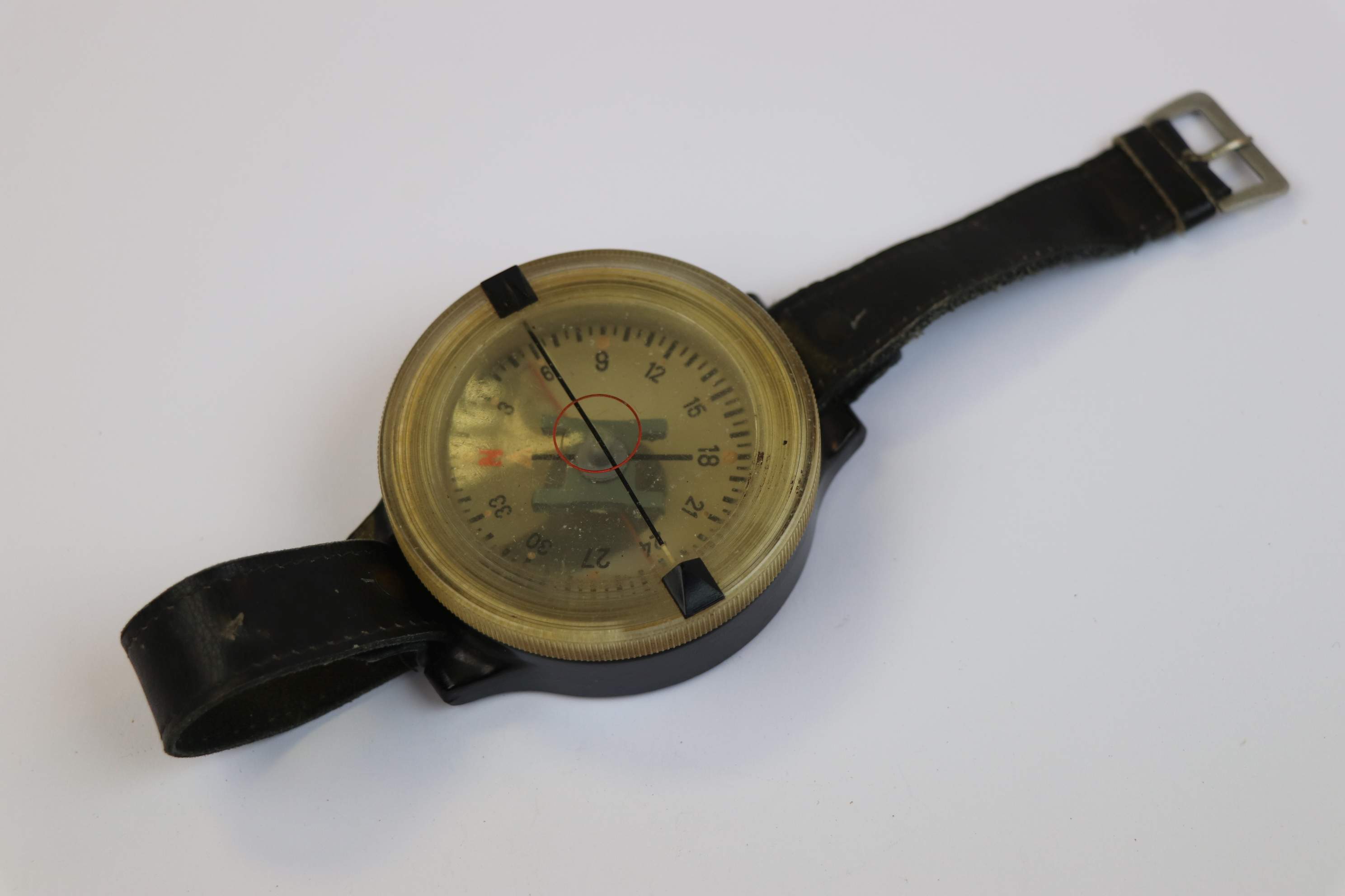 A WW2 German Luftwaffe Wrist Compass With Leather Strap, Markings To The Rear AK 39 FL 23235-1.
