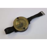 A WW2 German Luftwaffe Wrist Compass With Leather Strap, Markings To The Rear AK 39 FL 23235-1.