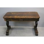 William IV Rosewood Library Table with rounded corners, two Frieze Drawers, raised on carved