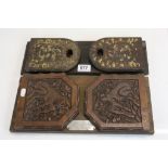 Carved Oriental book slide the ends carved with large carts possibly tigers and one other similar