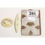 Mother of Pearl Dance Card case with Gold plated fittings, approx 9.5 x 6.5cm, a Swiss carved Horn