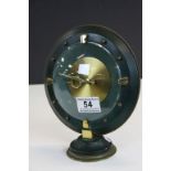 Art Deco style 8 day Clock in Brass & green painted Metal with curved glass front and marked to