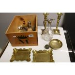 Vintage Wooden Wine box of mixed Metalware to include, Brass candlesticks, Bell Weights, Silver