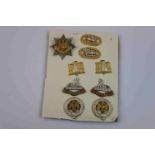 A Collection Of Gilt Metal East Anglia Brigade Officers Badges.