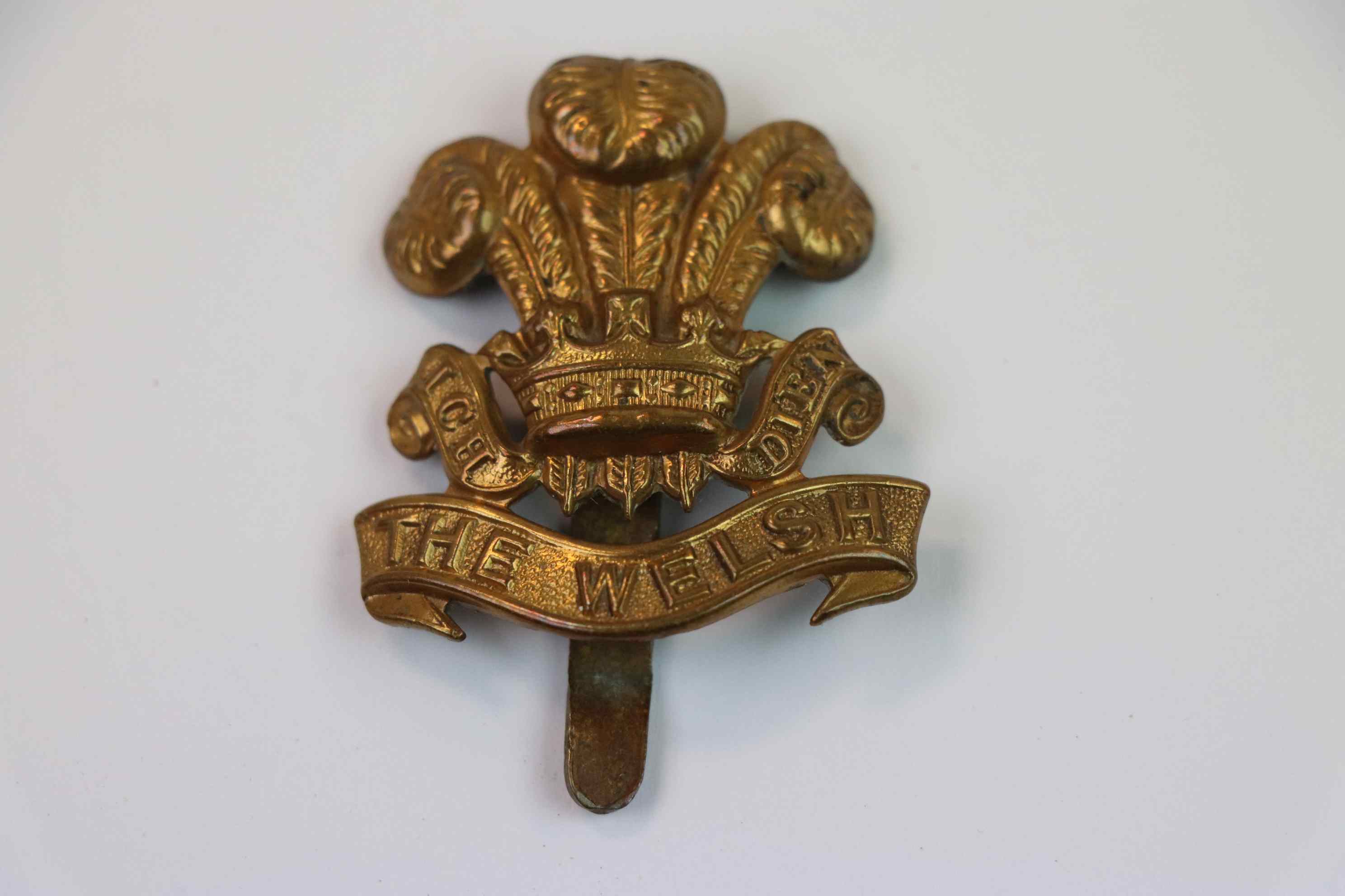 A Welsh Regiment All Brass Cap Badge.