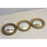 Three Regency Style Gilt Framed Circular Convex Mirrors with Ball decoration, 34cm diameter