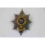 A Worcestershire Regiment Silvered Hat / Cap Badge.