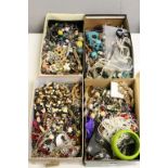 Four shoe boxes of mixed Costume jewellery