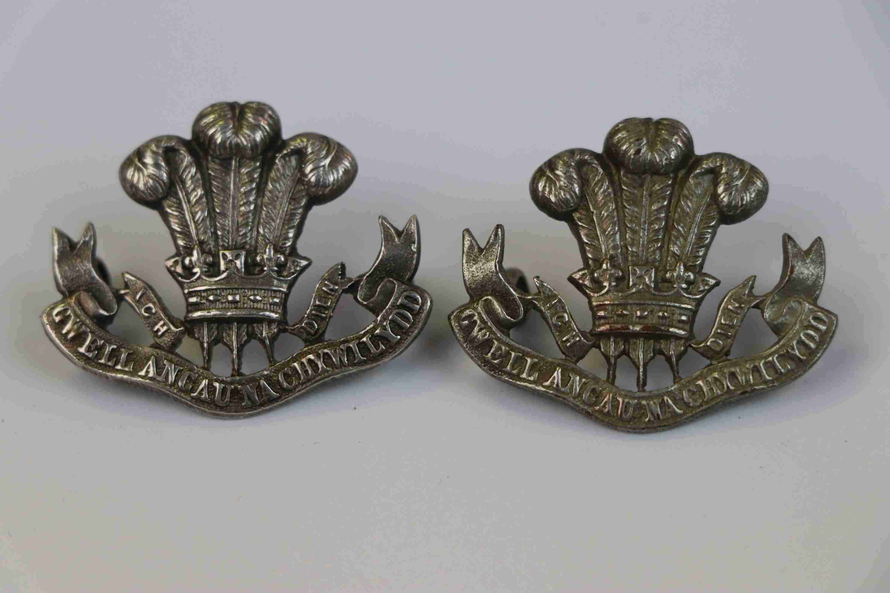 Two Silver Welsh Regiment Collar Badges.