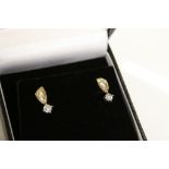 Boxed pair of stone set 9ct Gold "Footprint" earrings