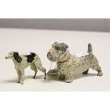 Two Cold Painted models of Dogs to include an Airedale Terrier approx 10cm long