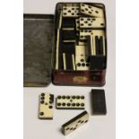 Vintage Bone & Ebony six spot Dominoes in a Macfarlane Lang & Co "Sample" tin