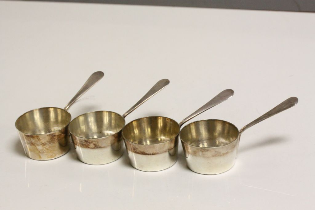 Set of four vintage silver plated brandy warmers