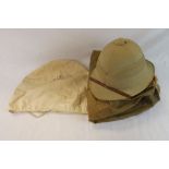 A Military Issued Pith Helmet With Original Bag Issued To 5721299 CPL. L.C. Higgins, To Also Include