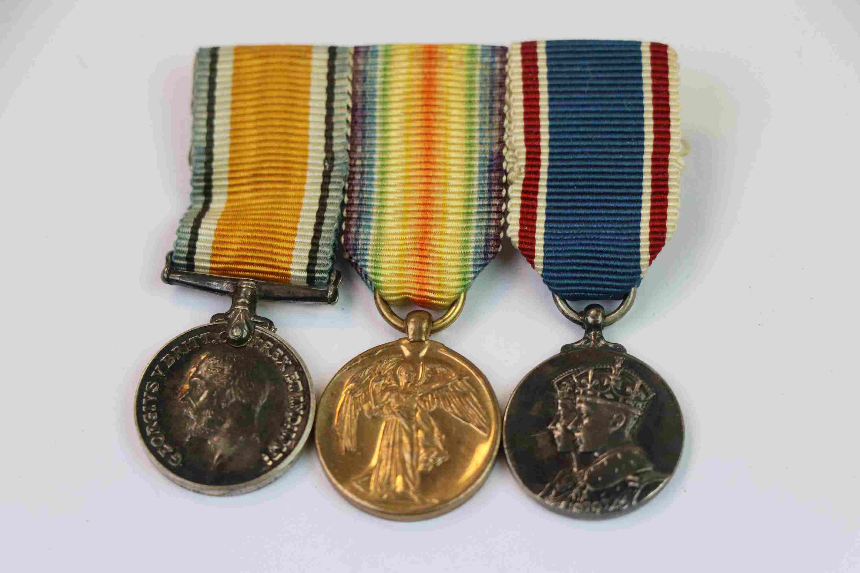 A World War One / WW1 British Miniature Medal Trio To Include The Victory Medal, The British War