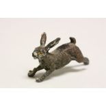 Cold painted model of a Running Hare, damage to one leg, approx 4cm long