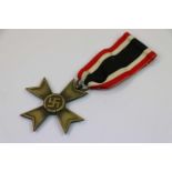 A World War Two German Third Reich Full Size War Merit Cross Without Swords Medal.