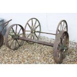 Heavy Iron Cart Wheels on Axles plus Set of Vintage iron wheels and axles