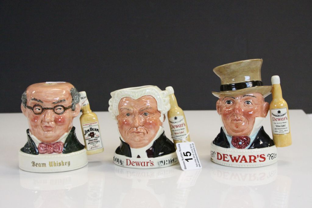 Three Royal Doulton Character & Whiskey Jugs to include; Jim Beam "Mr Pickwick / Sam Weller, Dewar's