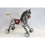 Painted wooden child's ride on zebra