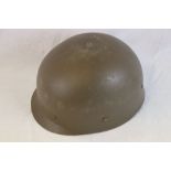 An Austrian M75 Helmet Liner.