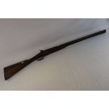 An Antique Percussion Cap Side By Side Double Barrel Shotgun.