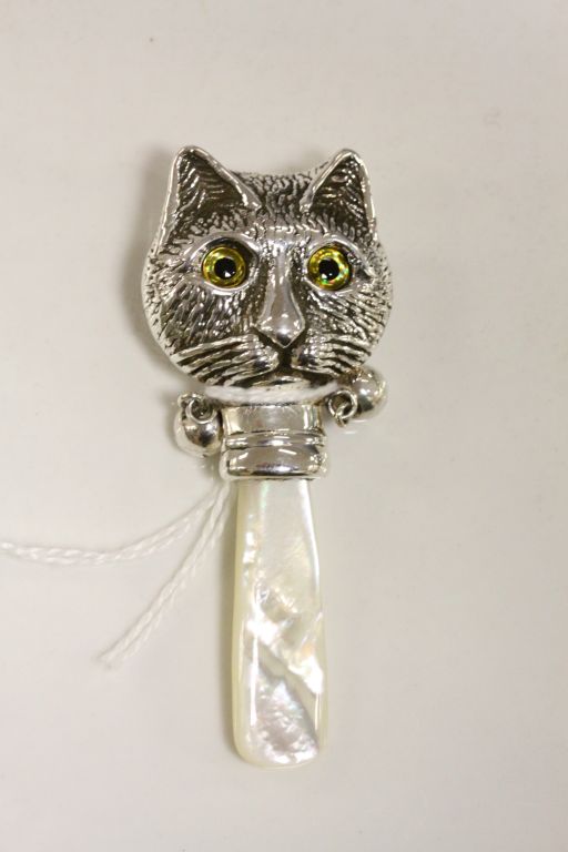 Silver babies rattle in the form of a cat