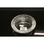 Lalique Lions head Ashtray or Pin dish, approx 14.5cm diameter and engraved "Lalique France" to