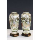 Pair of Japanese Satsuma Vases, both with Detailed Figural decoration & Countryside & black Seal