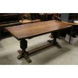 Mid 20th century Oak Jacobean Style Dining Table, the Trestle Base with Heavily Carved Cup & Cover