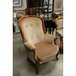 Victorian Style Spoon Back Upholstered Armchair with Scroll Arms and cabriole legs