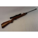 A Vintage Webley & Scott Ltd Webley Excel .22 / 5.5 Cal Air Rifle Together With A Bushmaster 4 x