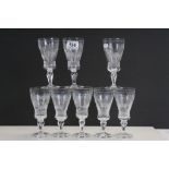 Set of eight wine Glasses with Engraved decoration, each signed "Kosta" to base, all eight approx