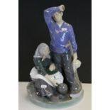 Large Royal Copenhagen ceramic Figural group of a Farmer & Wife, numbered to base 1352 and stands