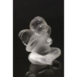 Lalique Glass model of a Seated Cherub approx 8cm tall and engraved "Lalique France" to base