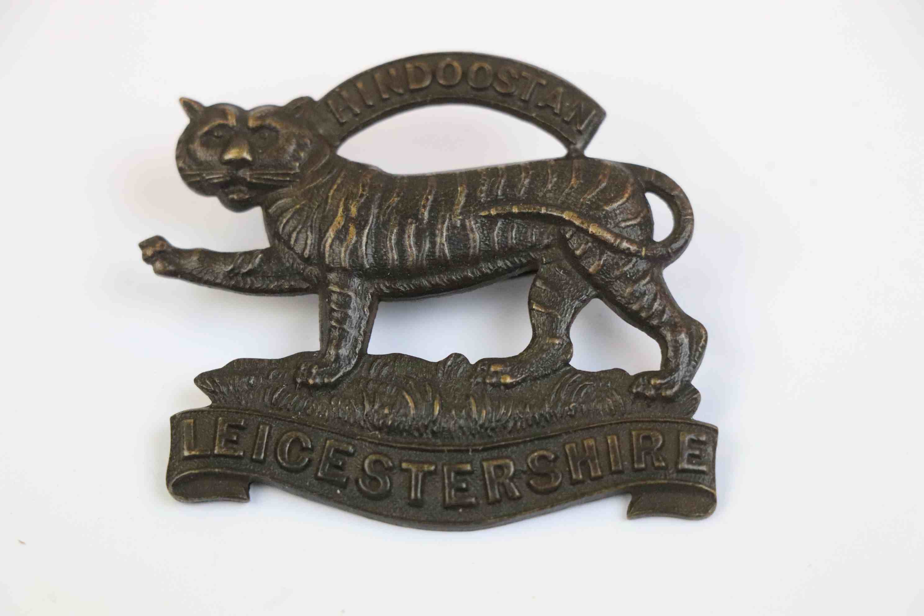 A Leicestershire Regiment Officer's Service Dress Cap Badge.