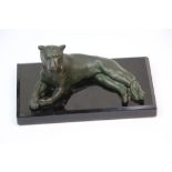 Patinated Bronze model of a Lioness on Deco style black base, approx 14 x 7.5 x 7cm at the widest