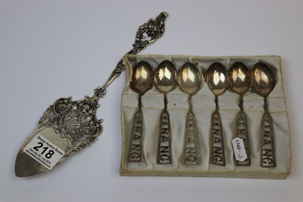 White metal set of six Oriental Teaspoons, the handles marked "Penang" plus a Hallmarked Silver