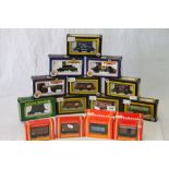 14 Boxed OO gauge items of rolling stock trucks and wagons to include Dapol x 6, Hornby x 4,