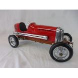 AM China tin plate and wooden Spindizzy Bantam Midget racing car in red, 18.5' approx length, vg