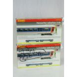 Two boxed Hornby OO gauge R2001 Networker Surburban Train Packs, both with damage
