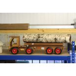 Scratch built wooden truck with flat bed, 30" approx. length, carrying log