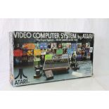 Boxed Atari Video Computer System to include console, 4 x controllers, 1 x video game, instruction