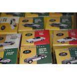 40 boxed Atlas Editions 1:43 Classic Sports Cars diecast models featuring Jaguar e-type, Fiat