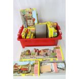 Group of HO gauge model railway trackside building sets, many boxes are either empty or